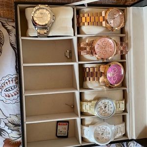 MK watch $100 each 1 is coach that one is $100